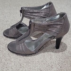 apostrophe silver sparkley shoes.  Zipper front.  Size is 7.5.